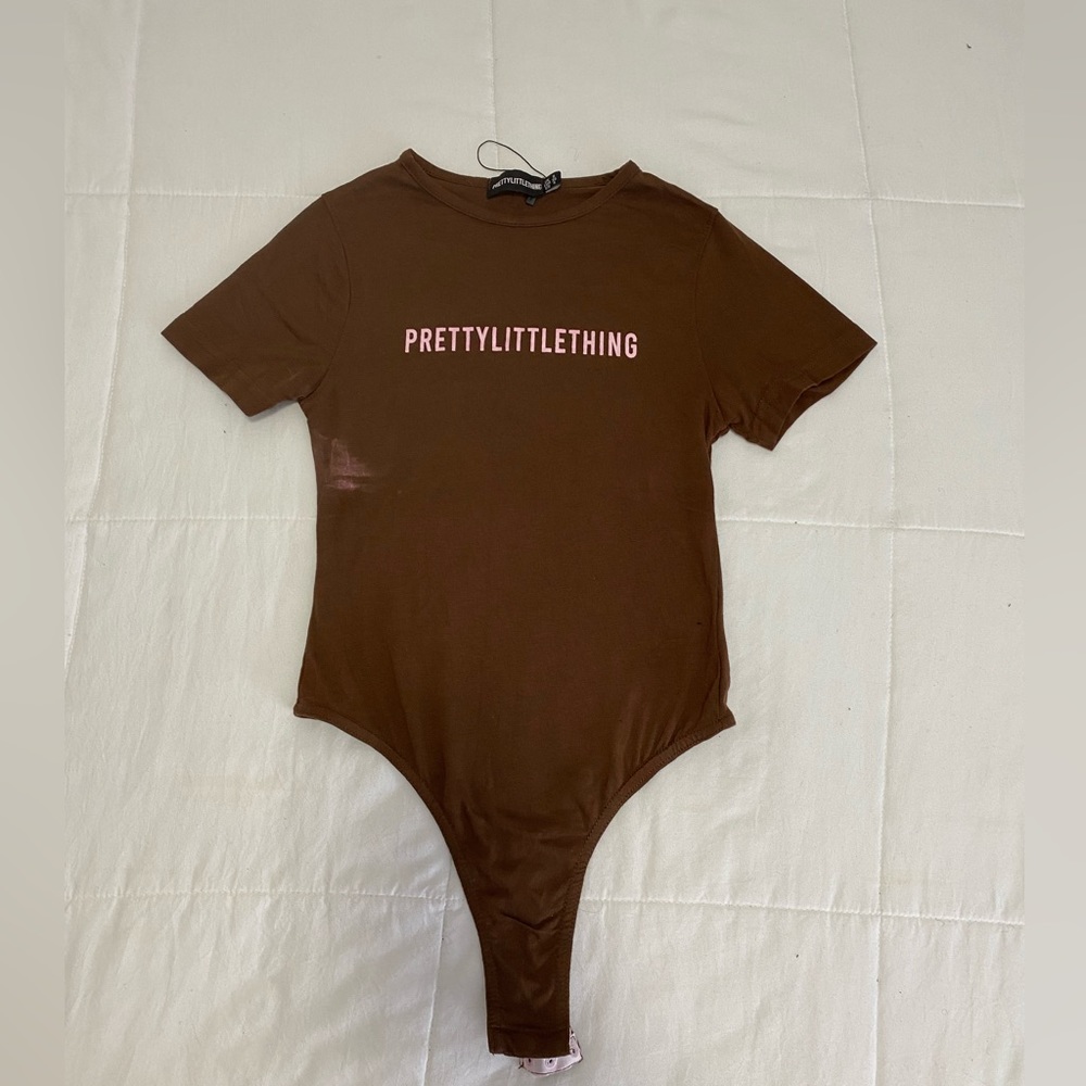 Pink and brown , pretty little thing bodysuit , size us 4